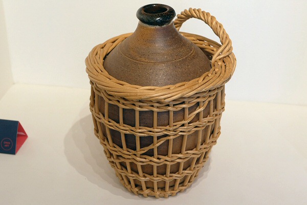 John Leach - Bottle in wicker basket