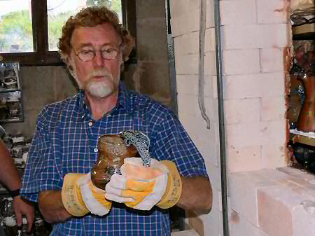 Toff checking a fish handled tankard hot from the kiln