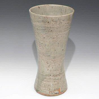 Celadon glazed stoneware waisted vase.