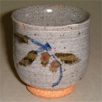 Stoneware Yunomi with flower decoration.