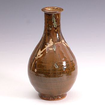 Korean bottle vase, kaki glaze, foliate decoration