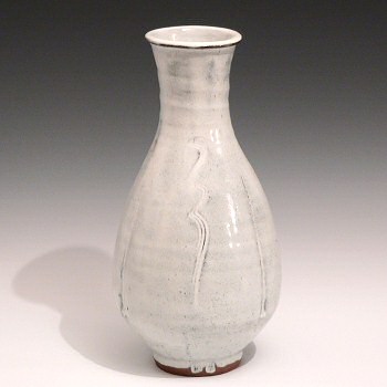 Stoneware vase with combed decoration.