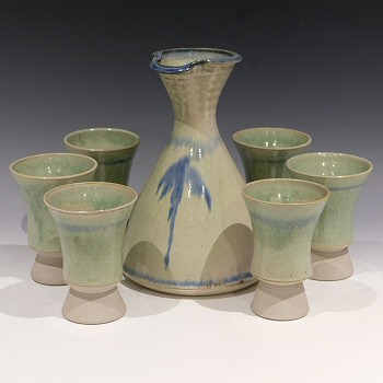 Stoneware decanter and set of 6 goblets.