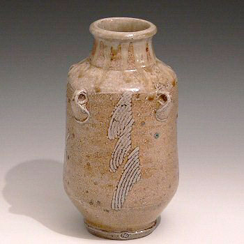Moulded salt glazed vase with sgraffito decoration