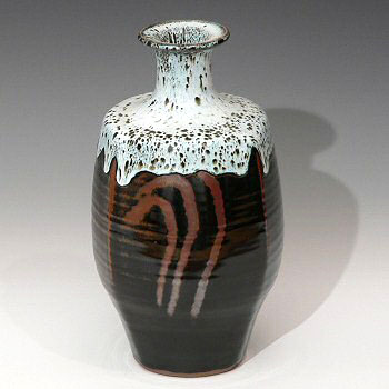 Moulded vase with nuka glaze over temmoku, style of Jim Malone