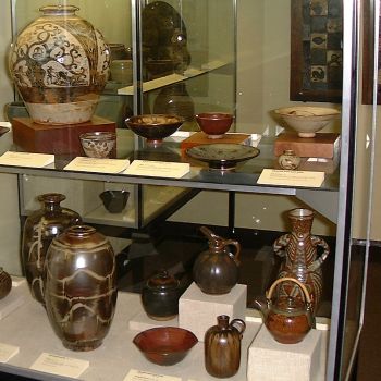 Selection of pots including a Bernard Leach Tree of Life vase