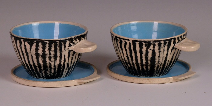 Eric Leaper - Pair of handled bowls with saucers