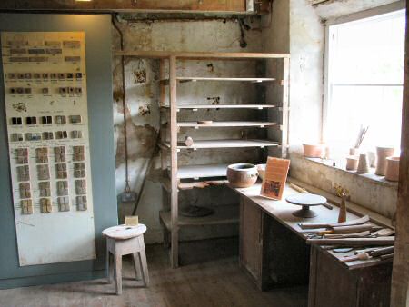 Old pottery studio area, showing board with examples of standardware glazes