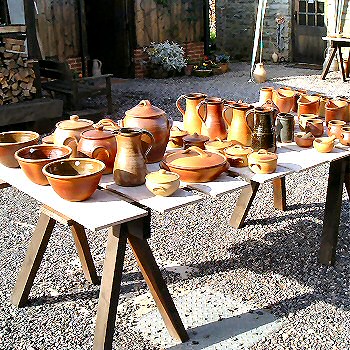 Trestle table with domestic pots